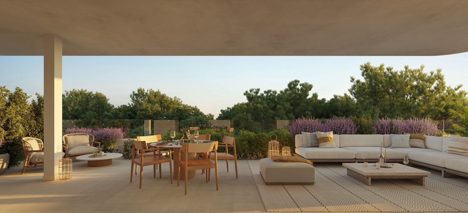 Luxe terras met buitenzitmeubelen en uitzicht op de tuin.